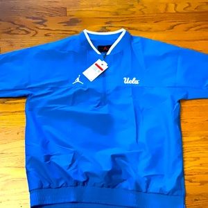 UCLA Bruins NIKE Jordan DM9160 Coaches 1/4 Zip S/S Wind Golf Jacket Men's Large